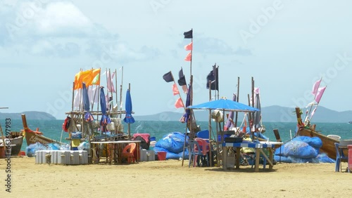 Wallpaper Mural Fishing boats docked at a beachfront facing the Gulf of Thailand in Pattaya, Chonburi province in Thailand. Torontodigital.ca