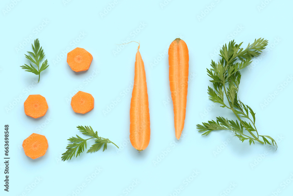 Slices of fresh carrots on turquoise background Slices of fresh carrots on turquoise background