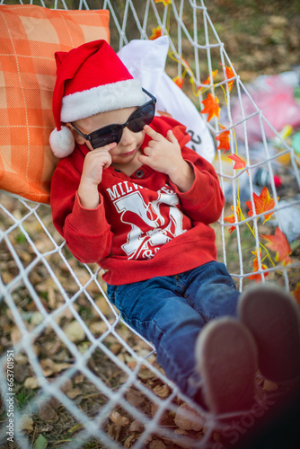 child in santa claus hat