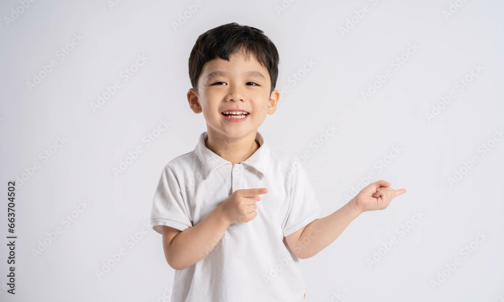 Portrait of asian boy posing on white background Portrait of asian boy posing on white background