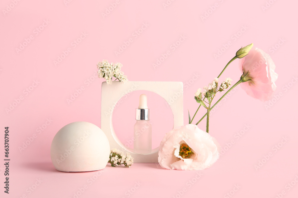 Composition with bottle of essential oil, plaster podium and beautiful flowers on pink background Composition with bottle of essential oil, plaster podium and beautiful flowers on pink background