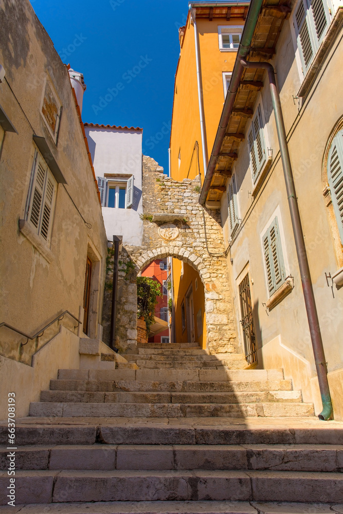 A quiet back street with steps in the historic centre of the medieval coastal town of Rovinj in Istria, Croatia