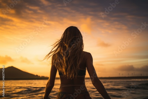 Beautiful girl in bikini on the beach at sunset. Vacation concept, Female surfer rear view in sea at sunset, Oahu, Hawaii, United States of America, AI Generated © Iftikhar alam