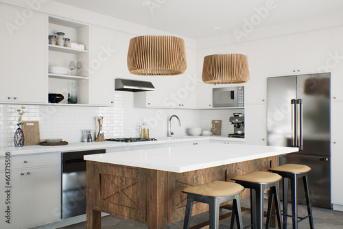 White kitchen with wood island and patterned wood fixtures with kitchen appliances and utensils. 