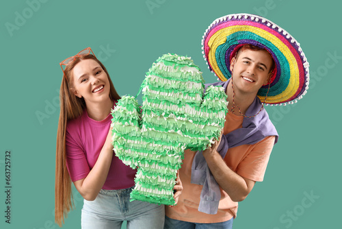 Young couple with Mexican p...