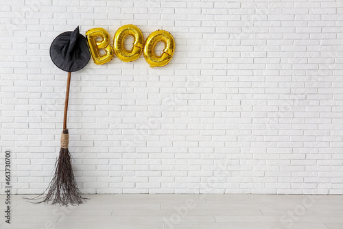 Broom, hat and text BOO mad...