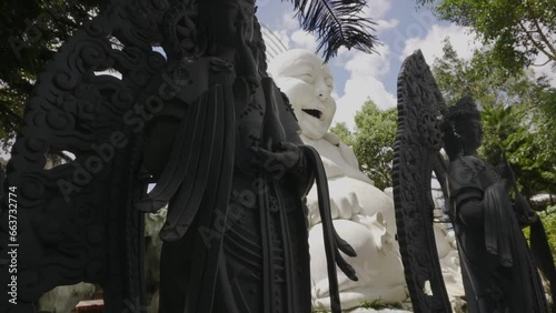 Happy buddah statuein garden vietnam da lat photo