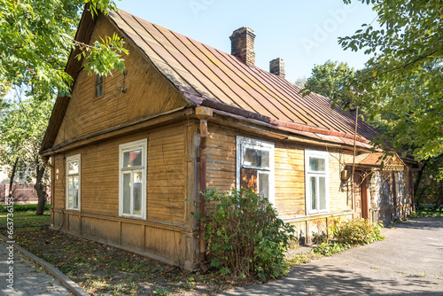 example of hundred-year-old historical old wooden building and homestead of private sector in wooden constructivism style