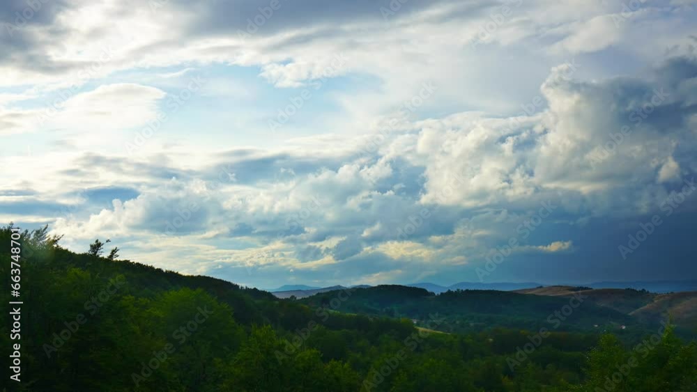 Nature landscape cumulus clouds rolling over hills and mountains time-lapse Nature landscape cumulus clouds rolling over hills and mountains time-lapse
