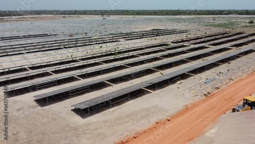 Discovering huge photovoltaic power plant with solar panels under construction in Jambur, Gambia photo