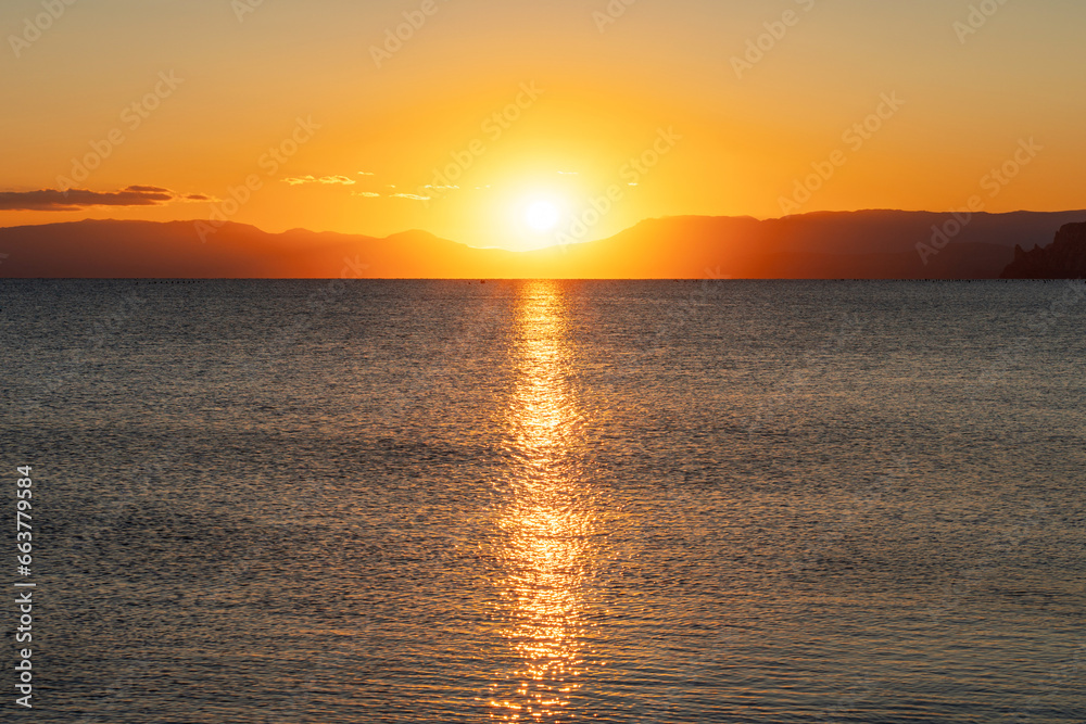 Beautiful sea background sky and clouds for summer travel with the sun.