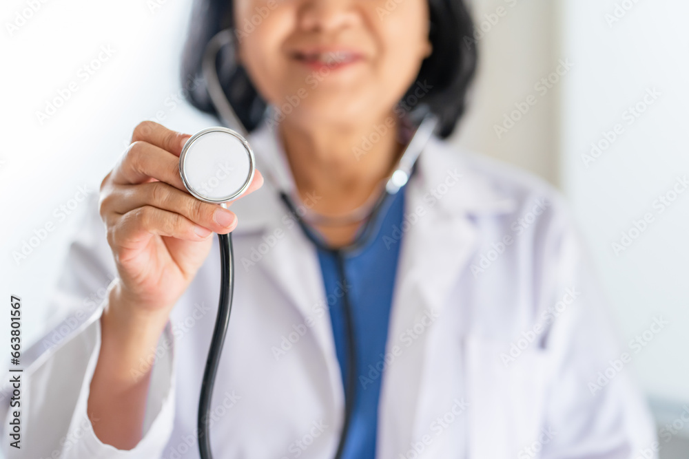 Doctor holding stethoscope in hand Doctor check body by stethoscope Healthcare and medical check up concept. Doctor holding stethoscope in hand Doctor check body by stethoscope Healthcare and medical check up concept.