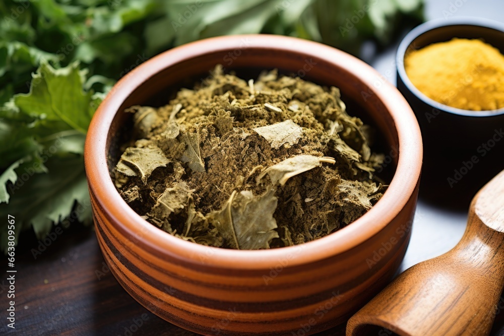 kale chips with garlic powder in a brown bowl kale chips with garlic powder in a brown bowl