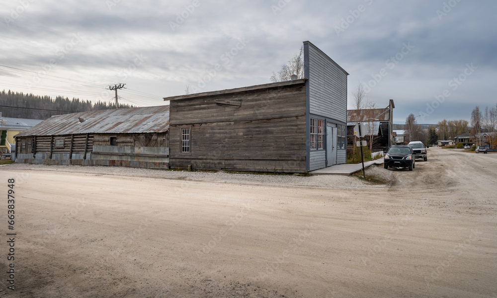 Street intersection in Dawson City, Yukon, Canada with historic wooden building Street intersection in Dawson City, Yukon, Canada with historic wooden building