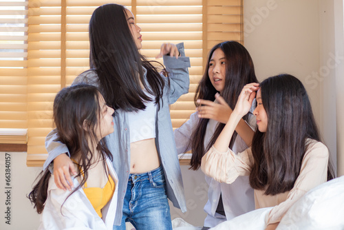 Happy asian woman friend meeting in cozy house