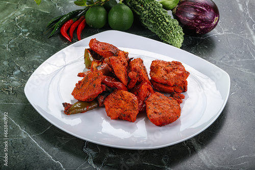 Indian cuisine - chicken tikka barbecue photo