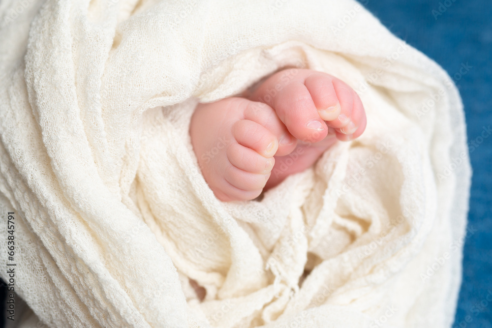 twisted child. Soft feet of a newborn. twisted child. Soft feet of a newborn.