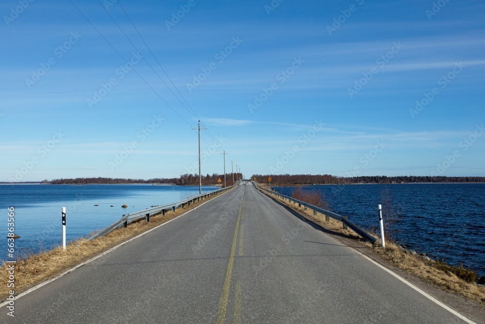 Coastal road on the island of Raippaluoto in spring, Vaasa, Finland.