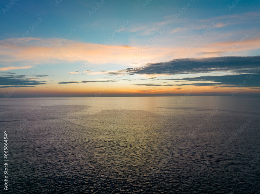 Aerial view sunset sky over sea,Nature Light Sunset or sunrise over ocean,Colorful dramatic scenery sky, Amazing clouds and waves in evening sky, Beautiful light nature background