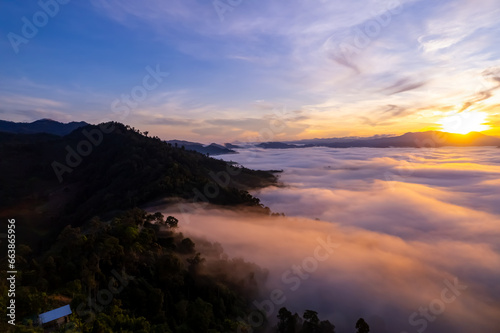 Amazing Sunrise or sunset over mountains hills covered with mist  Aerial view landscape drone shot beautiful colorful nature background