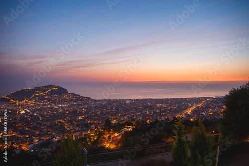 View from the mountains on Alanya  Turkey. Cityscape with sunset over the mountains
