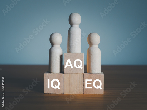 IQ, EQ and AQ Intelligence quotient on wooden blocks