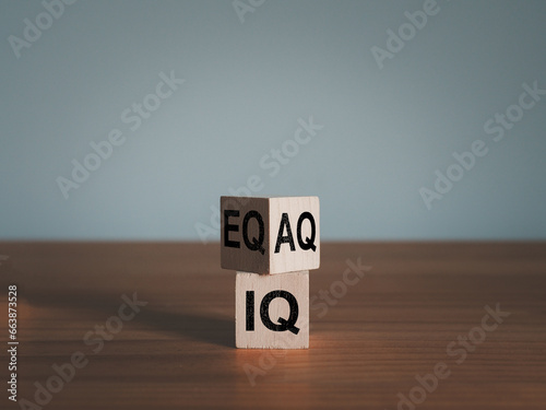 IQ, EQ and AQ Intelligence quotient on wooden blocks