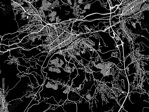 Vector road map of the city of Tajimi in Japan with white roads on a black background.