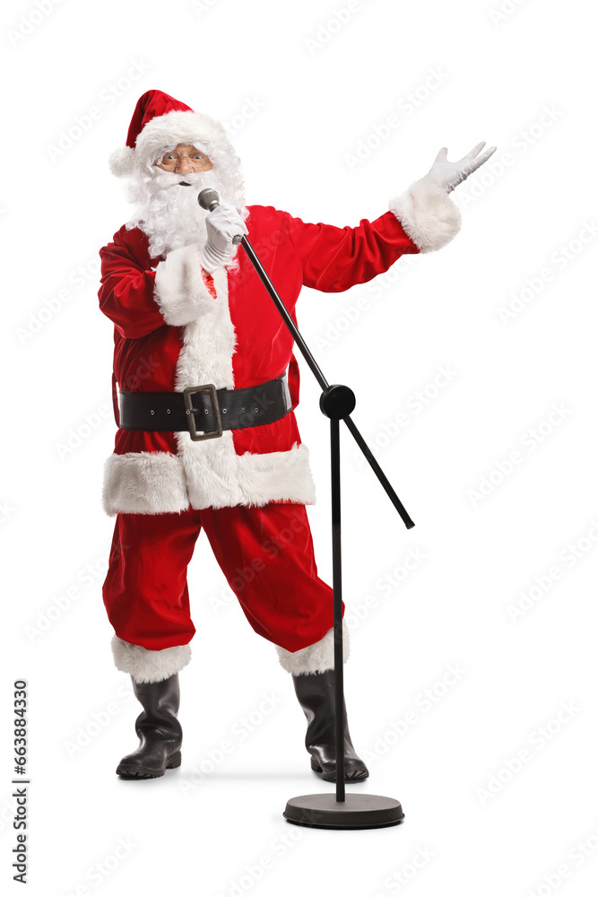 Cheerful santa claus with a microphone singing Cheerful santa claus with a microphone singing
