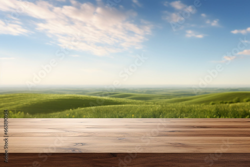 wooden countertop green blurred field in the background © Koray