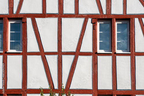 Fotografie background of half timbered historic wall in red and white