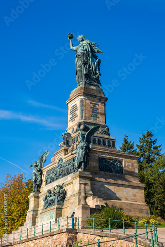 View of the Niederwald Monument, also known as Germania, on a sunny autumn day in the vineyards above Rüdesheim am Rhein/Germany photo