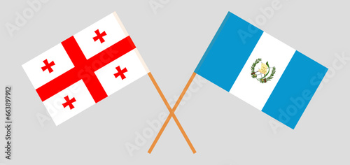 Crossed flags of Georgia and Guatemala. Official colors. Correct proportion