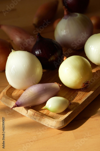Different kinds of peeled onions