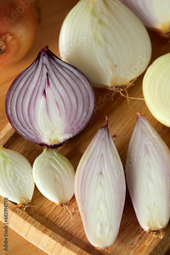 Halved onions in a wood plate