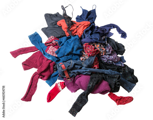 Pile of scattered clothes. Dump of used clothes. Second hand