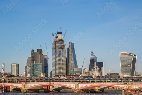 London cityscape with some famous landmarks and the Blackfriars traffic and railway bridges photo