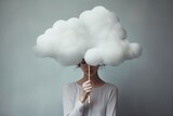 A sad woman hidden behind a cloud, concept of loneliness and depression