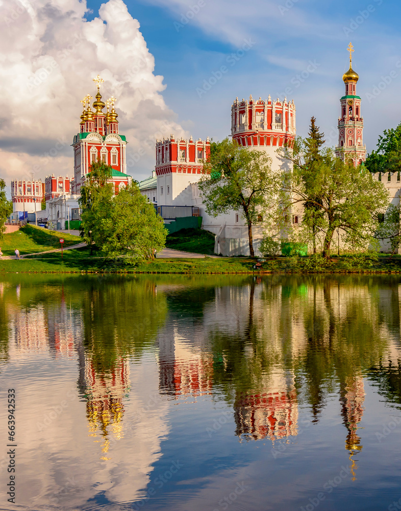 Novodevichy Convent (New maiden's monastery) reflected in pond, Moscow, Russia