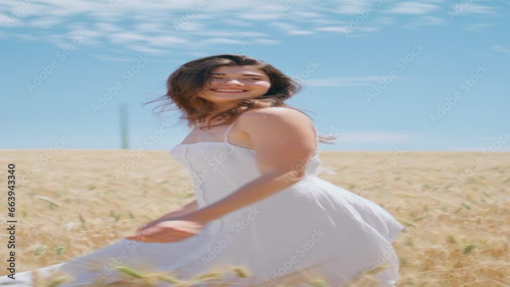 Beaming lady walk sunny wheat farmland vertical. Happy girl spin summer nature Beaming lady walk sunny wheat farmland vertical. Happy girl spin summer nature