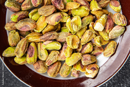 pistachios peeled nut healthy eating cooking appetizer meal food snack on the table copy space food background rustic top view
