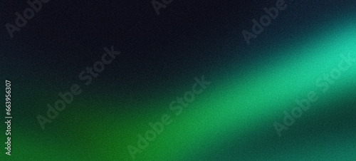 Glowing green grainy texture background blurred light gradient black green dark banner backdrop