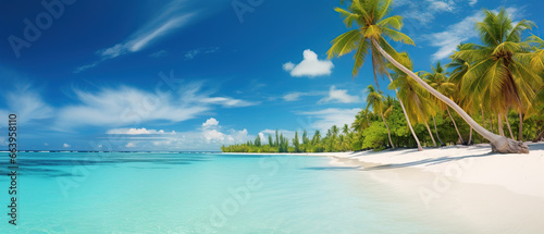 Leinwand Poster Bright tropical landscape with beautiful palm trees, turquoise ocean and blue sky with clouds