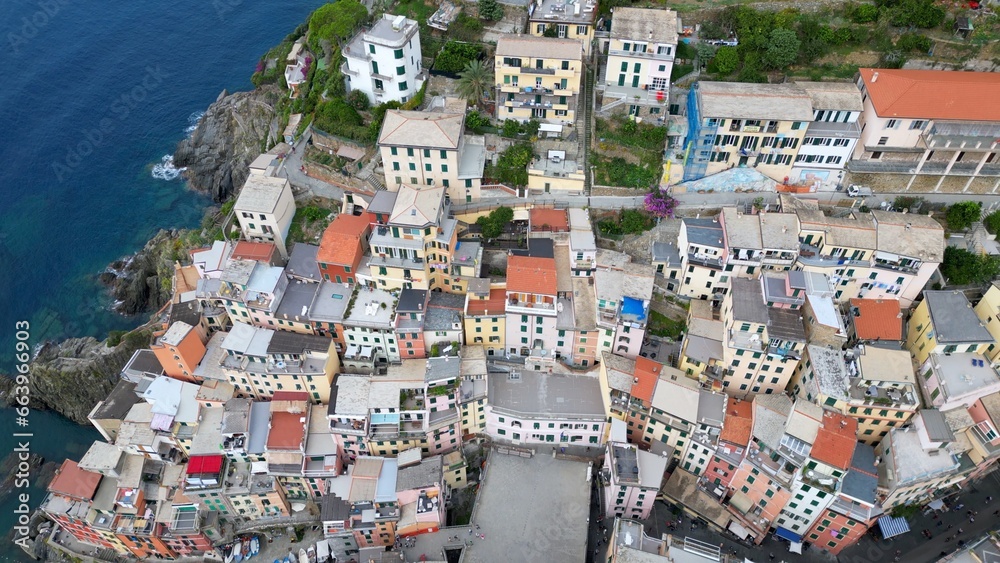 Europe, Italy, Liguria, Cinque Terre - Drone aerial view of Riomaggiore - The Cinque Terre are an increasingly popular tourist attraction for tourists from all over the world Unesco Heritage 