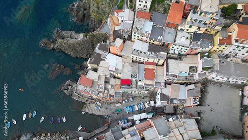 Europe, Italy, Liguria, Cinque Terre - Drone aerial view of Riomaggiore - The Cinque Terre are an increasingly popular tourist attraction for tourists from all over the world Unesco Heritage  photo