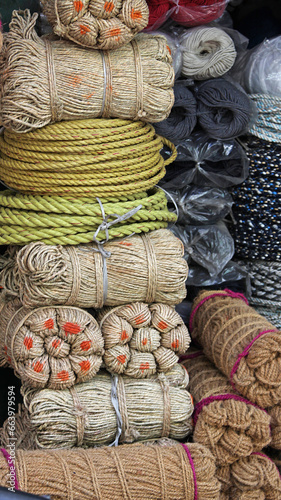 A range of of rope and cord on sale in a market in Rajasthan, India photo