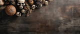 Creepy Halloween banner. Skulls and pumpkin on brown background. Copy space for text.