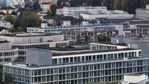 day time zurich sood oberleimbach modern office complex rooftop residential buildings exterior aerial panorama 4k switzerland photo