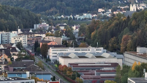 day time sood oberleimbach town train arriving on station aerial panorama 4k switzerland photo