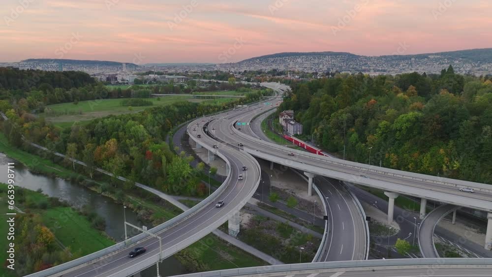 sunset time zurich city district traffic street road interchange aerial panorama 4k switzerland sunset time zurich city district traffic street road interchange aerial panorama 4k switzerland